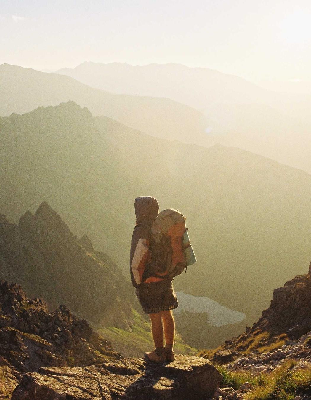 A hiker on a mountain ridge